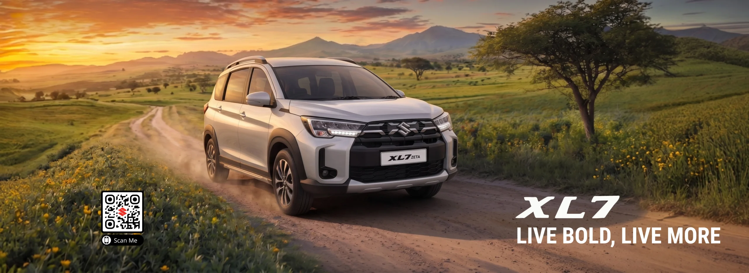 SUV Suzuki XL7 Zeta berwarna putih metalik melaju di jalan tanah pedesaan yang dikelilingi perbukitan hijau dan bunga kuning saat matahari terbit di Kota Batam.